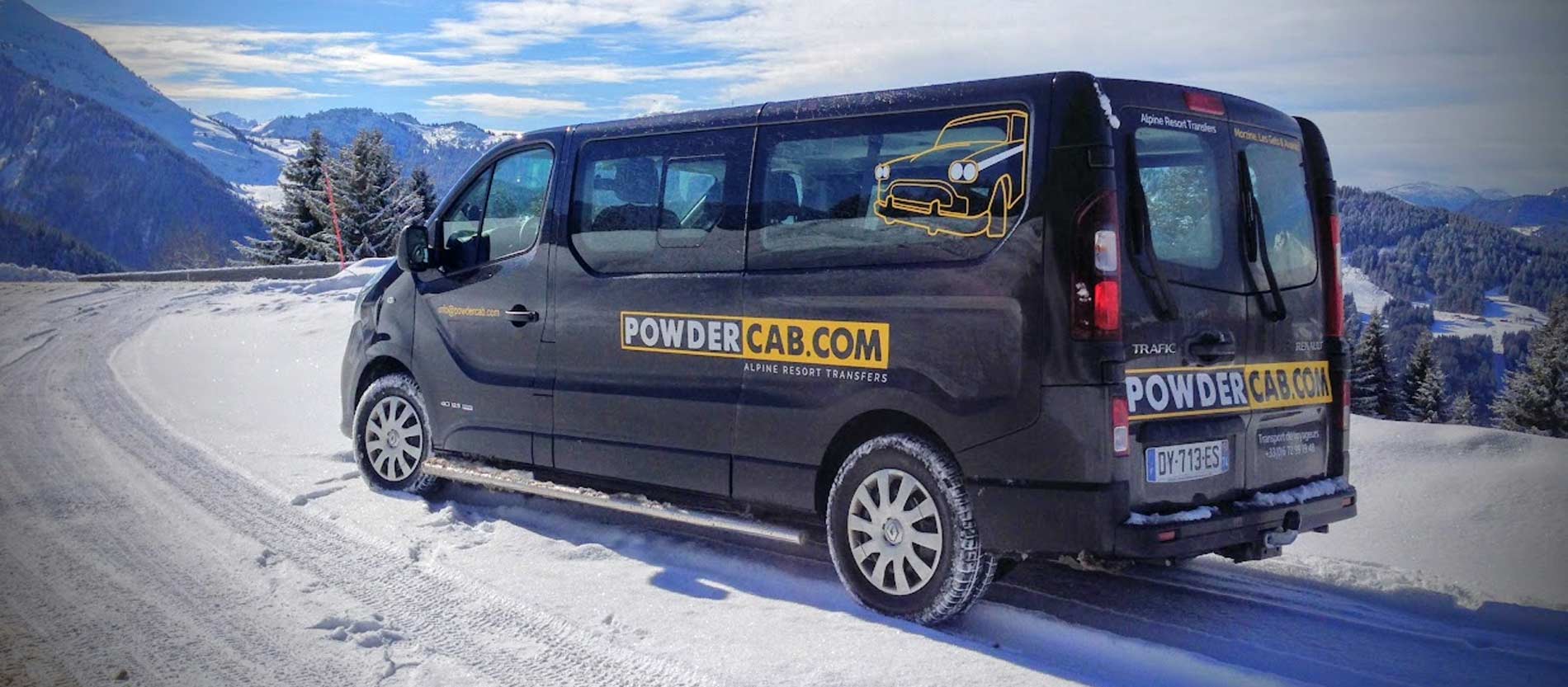 PowderCab minibus on a snowy road on the way to Morzine